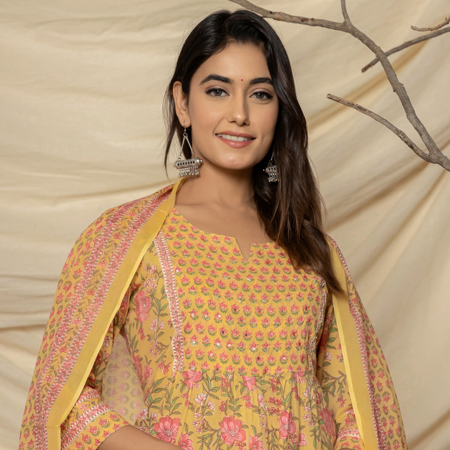 Model happily dressed in the Yellow Lily Printed Cotton Suit by Cottons Daily.