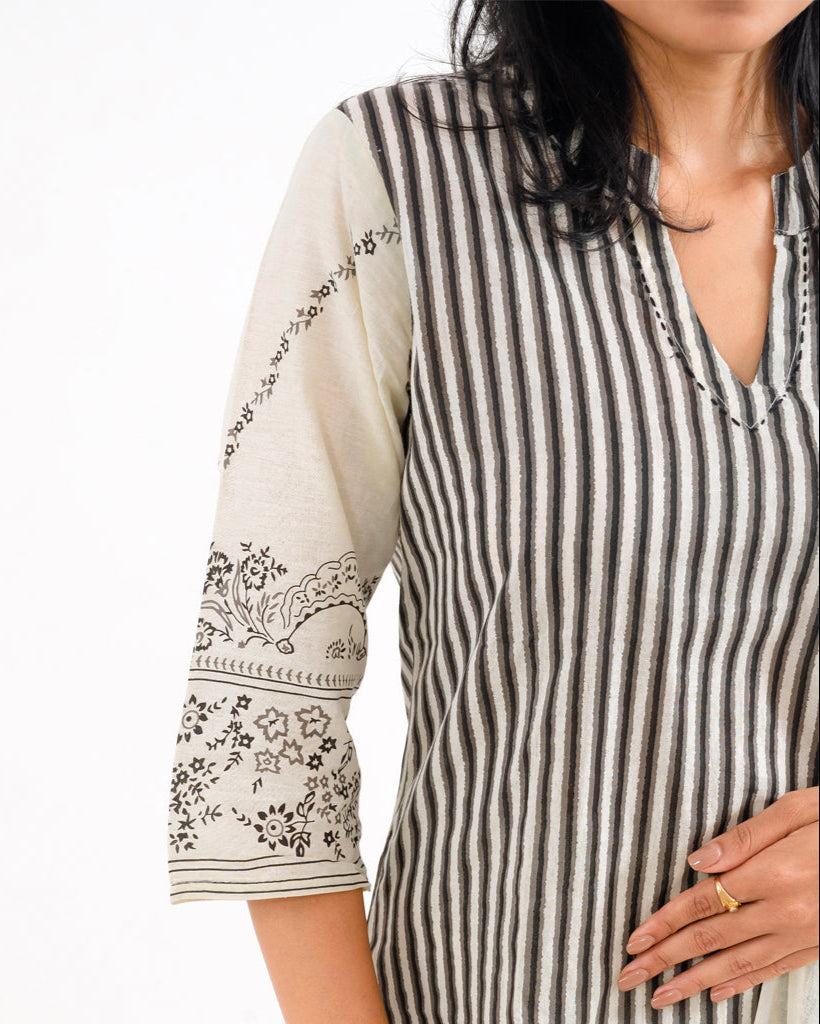 Close-up of the Stripe Printed Black & White Cotton Suit by Cottonsdaily, detailing the pure cotton fabric, Chinese collar with slight V-cut neck, and the intricate stripe design on the kurta.