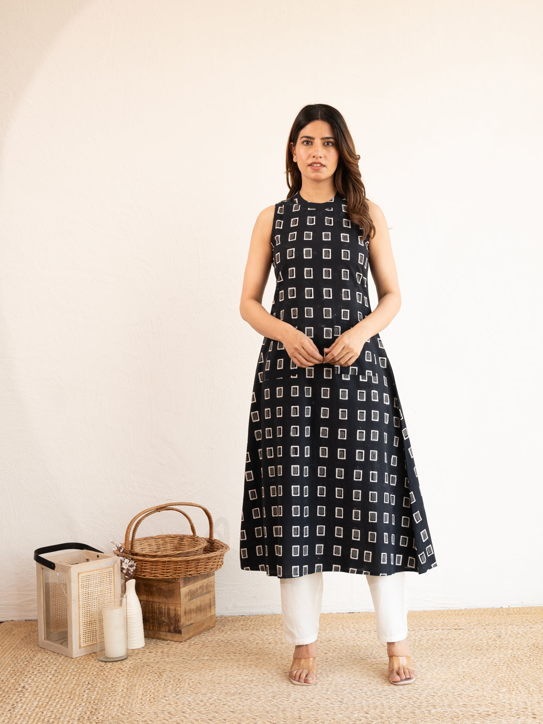 Full front view of the simple and stylish Everyday Black A-line Cotton Kurta, showcasing the rich black color and the comfortable A-line shape.