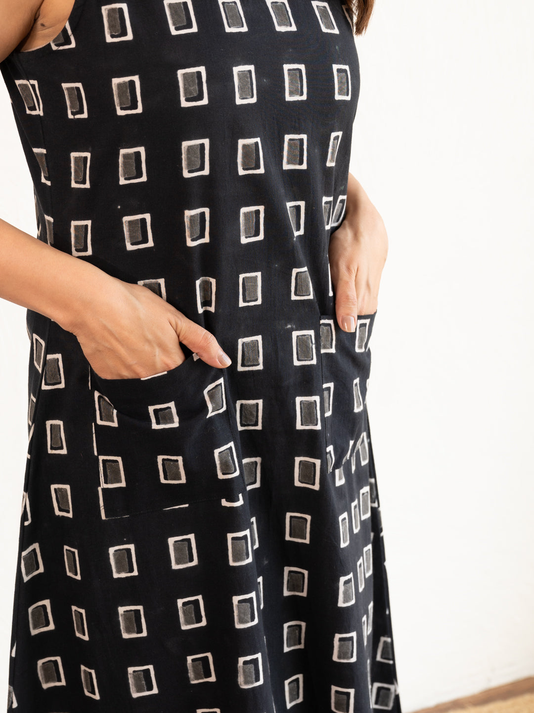 Close-up image showing the natural texture of the soft, breathable black cotton fabric used in the Everyday A-line Kurta.