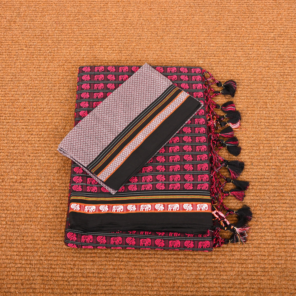 A stunning Abha Rani Pink Hati Mor Cotton Khun Saree from Cottons Daily, featuring a rich black body intricately woven with vibrant pink elephants and peacocks, creating a striking pink effect. The traditional Maharashtrian khun fabric gives it a lightweight yet luxurious feel.