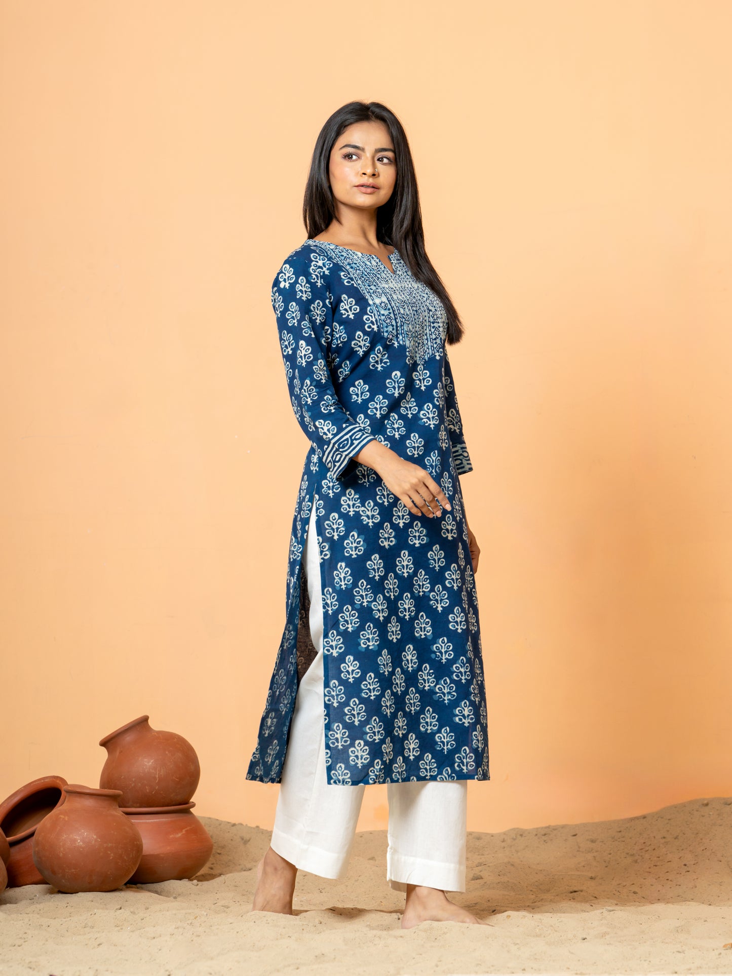 Stylish shot showing the Indigo Peacock Feather Print Cotton Kurta being worn, perfect for festive events or casual wear.