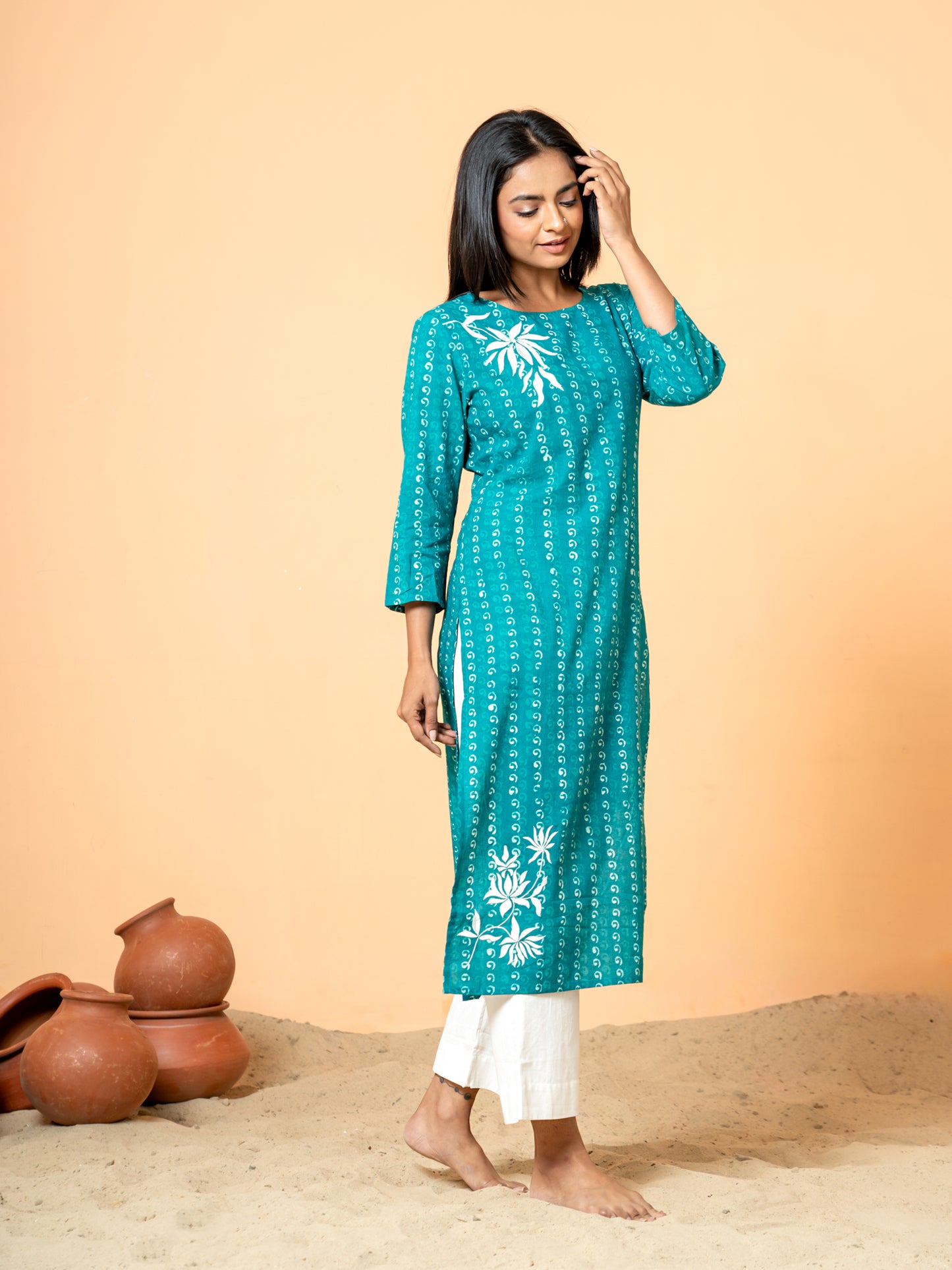 Detailed view of the 3/4th sleeves on the Sea Green Pearl Work Cotton Kurta, featuring intricate handblock patterns and pearl accents by Cottons Daily.