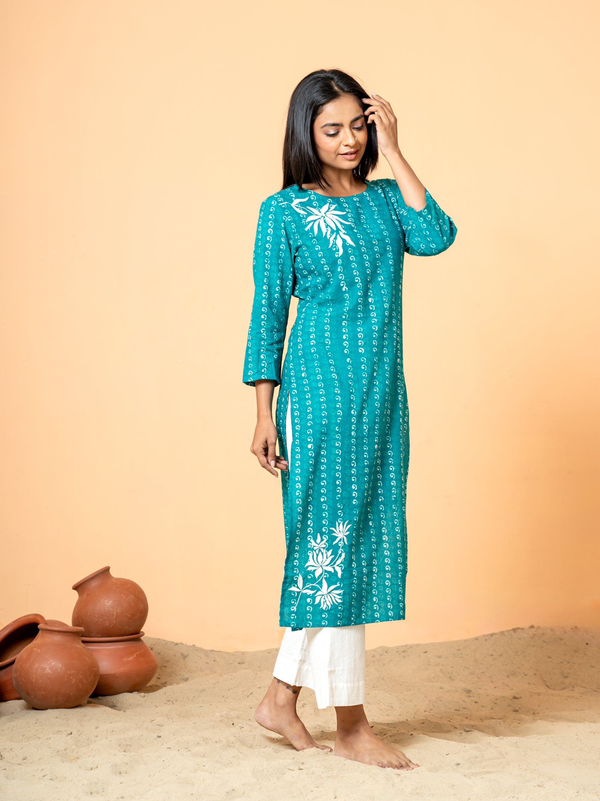 Detailed view of the 3/4th sleeves on the Sea Green Pearl Work Cotton Kurta, featuring intricate handblock patterns and pearl accents by Cottons Daily.