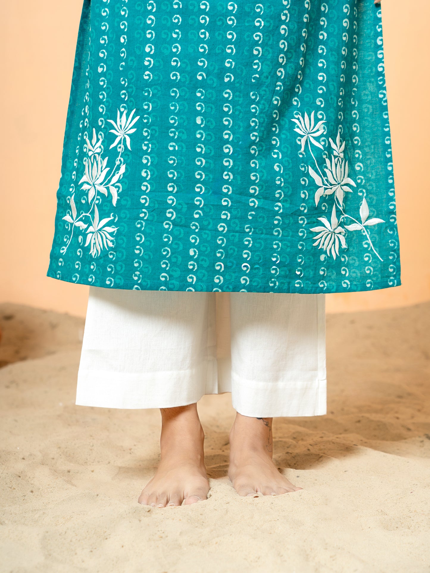 Detailed close-up of the intricate pearl work embellishments on the Sea Green Cotton Kurta, highlighting the craftsmanship.