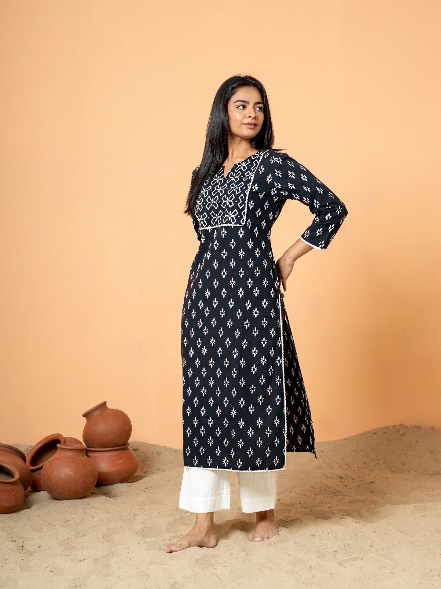 Stylish shot of the Black Sequence Work Rangoli Cotton Kurta, ideal for party wear, casual outings, and festive celebrations, highlighting its unique design.