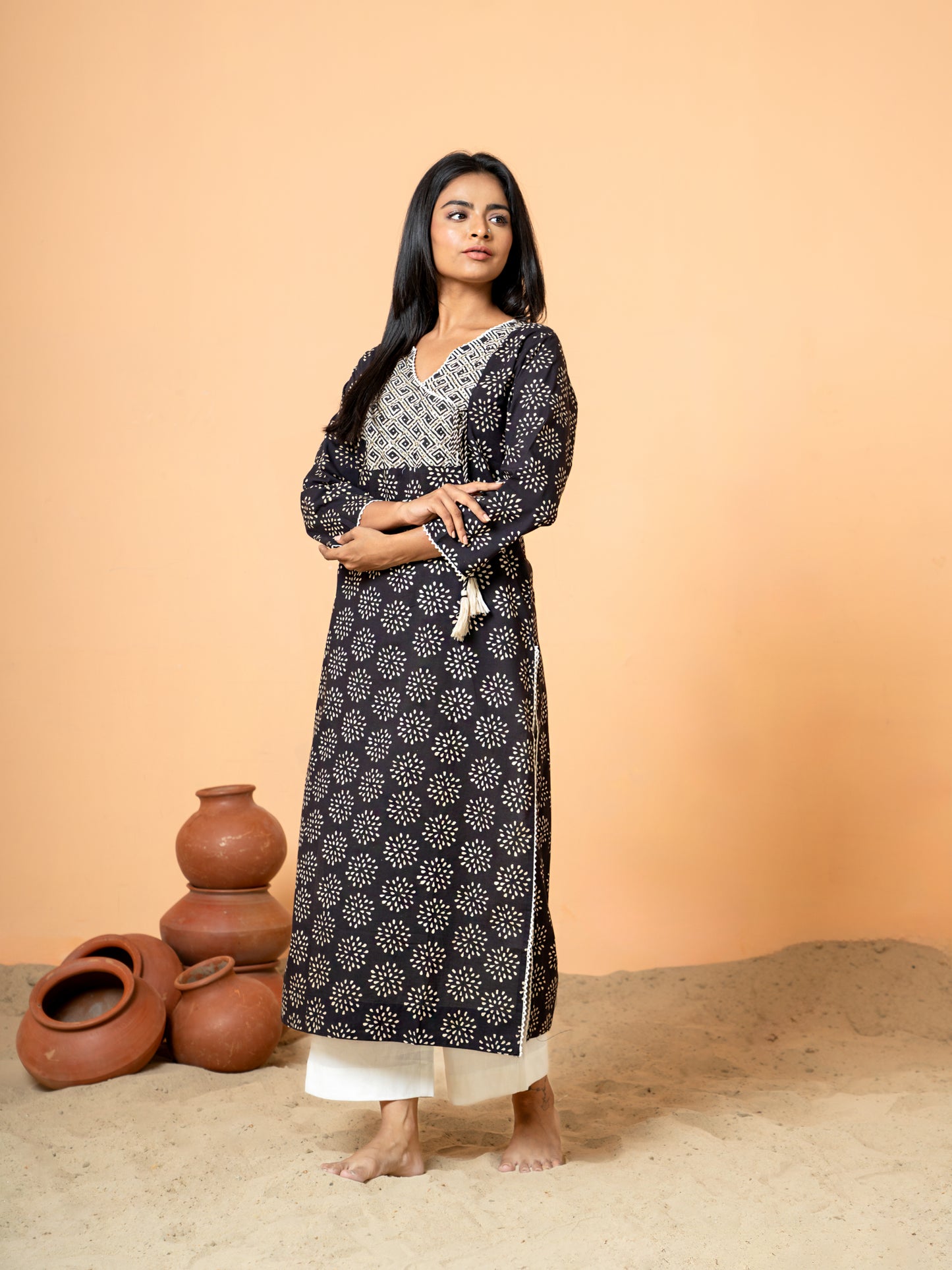 Full front view of the Black Embroidered Rangoli Print Cotton Kurta made from pure cotton with intricate embroidery.