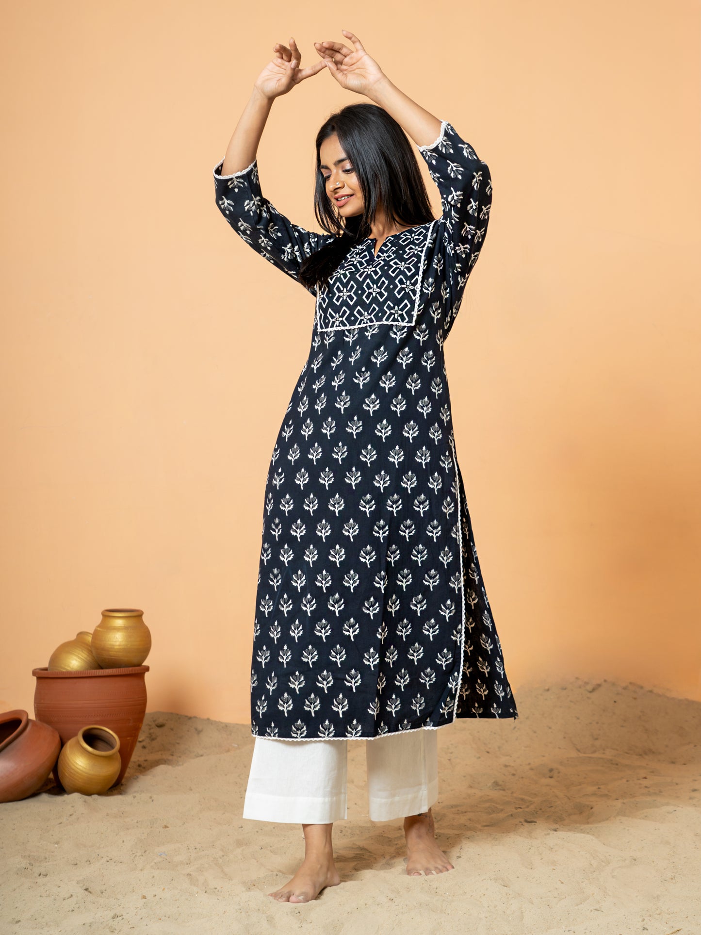 Stylish shot showing the Black Leaf Print Lace Work Cotton Kurta being worn, perfect for festive occasions or casual wear.