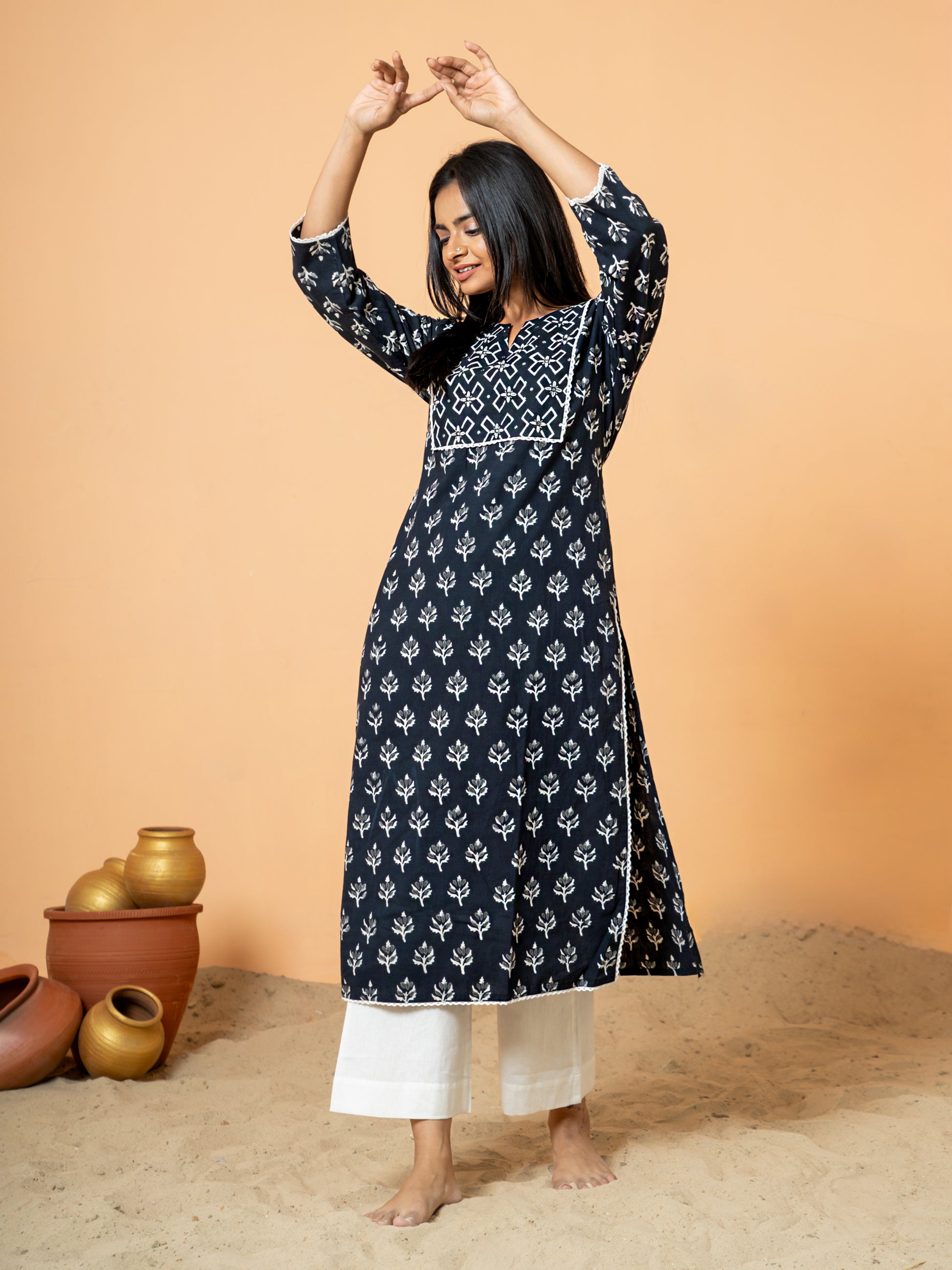 Stylish shot showing the Black Leaf Print Lace Work Cotton Kurta being worn, perfect for festive occasions or casual wear.