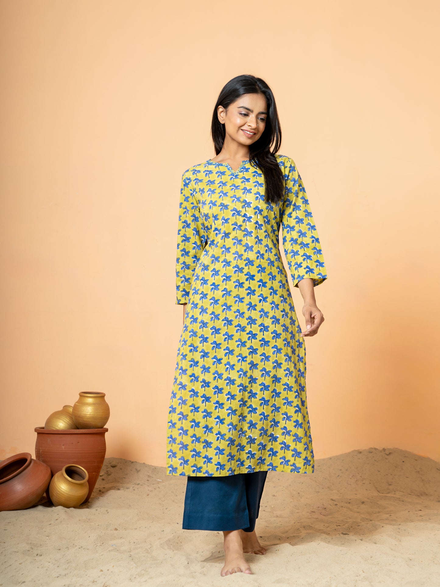 Image focusing on the soft, breathable pure cotton fabric texture and the drape of the Green Nayantara Printed Kurta.