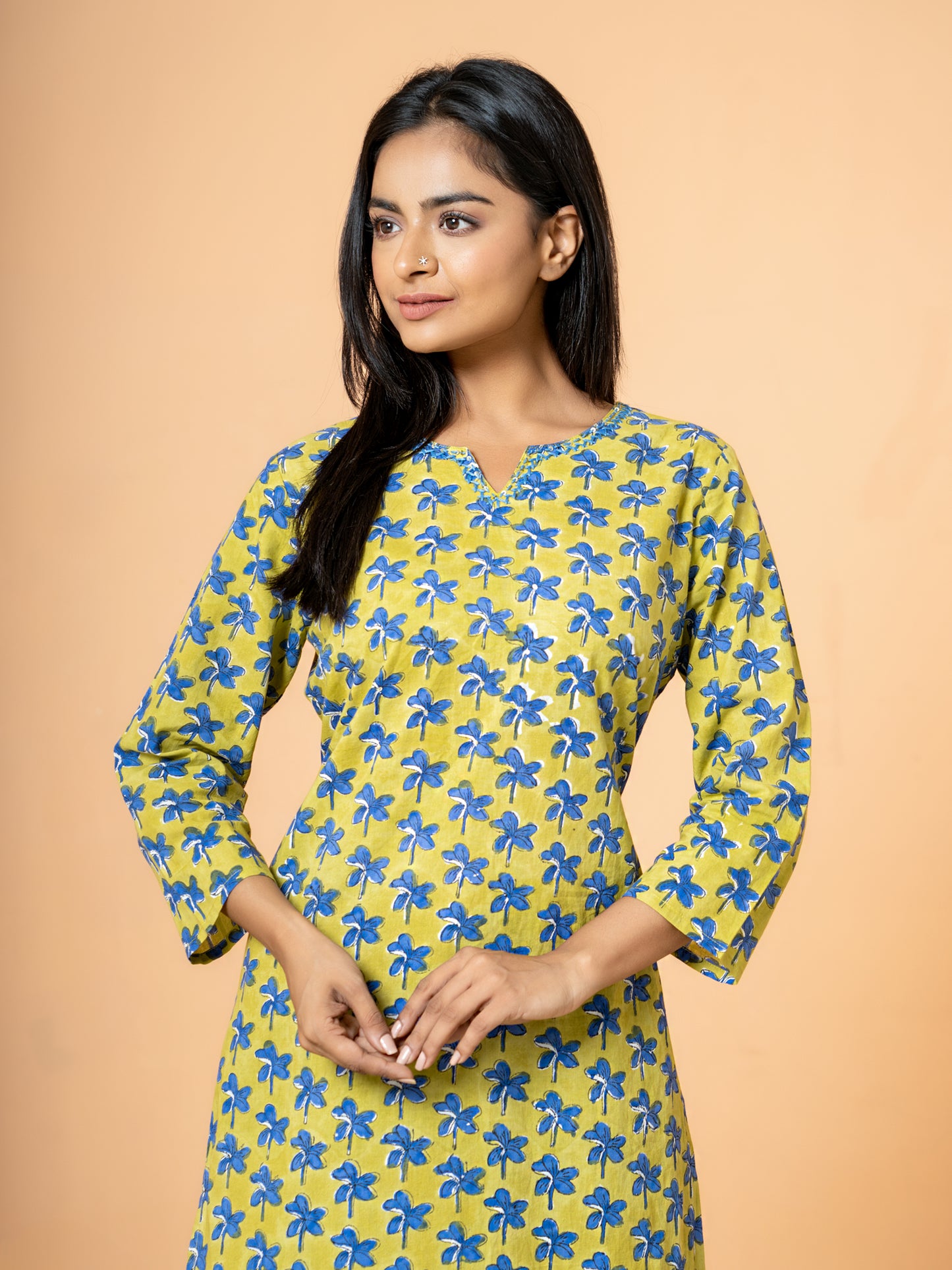 Image showing the comfortable regular fit and 3/4th sleeves of the versatile Green Nayantara Printed Cotton Kurta, perfect for casual or festive wear.