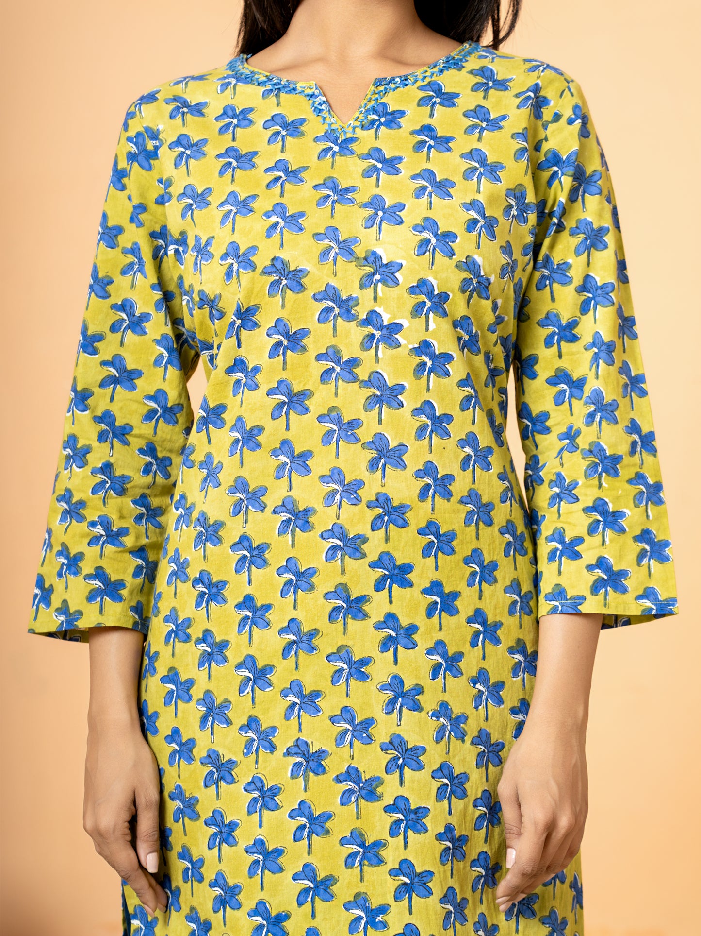 Detailed view of the stylish Round V Neck design and surrounding Katha work on the elegant Cotton Kurta for women.