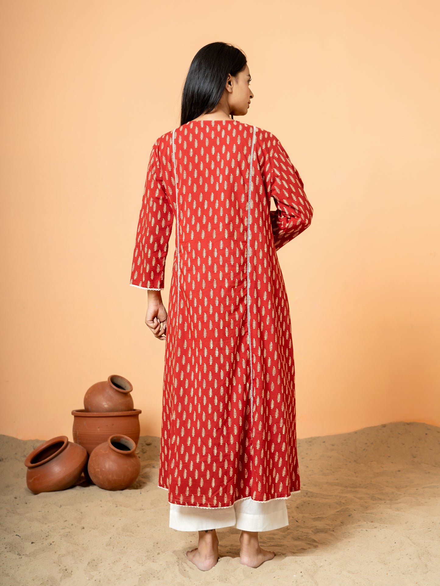Back view of the Red Palm Leaf Printed Cotton Kurta, emphasizing its unique blue hue and intricate leaf print design, ideal for festive occasions and party wear.