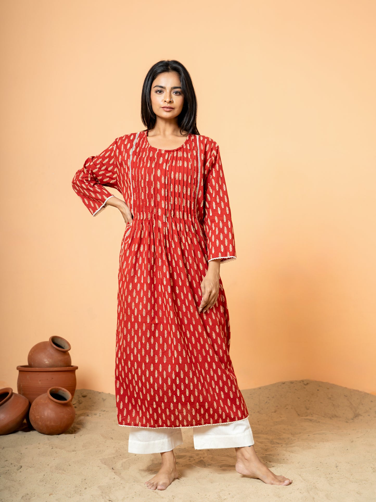Full front view of the elegant Red Palm Leaf Printed Cotton Kurta, showcasing the beautiful blue hue, intricate leaf print design, classic round neck, and 3/4th sleeves on soft, pure cotton fabric.