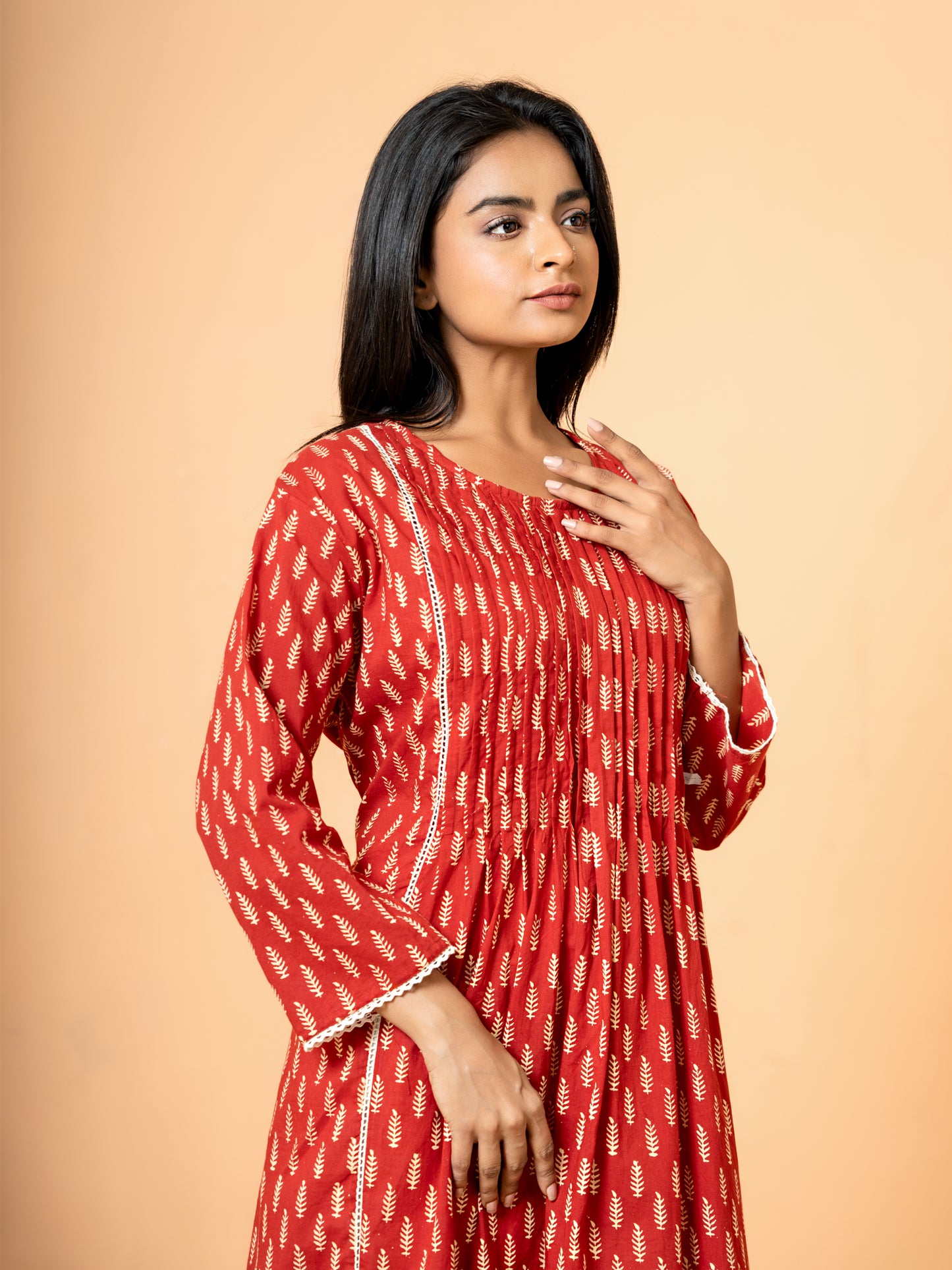Image showing the comfortable and versatile 3/4th sleeves of the elegant Red Palm Leaf Printed Cotton Kurta, perfect for all seasons and events.