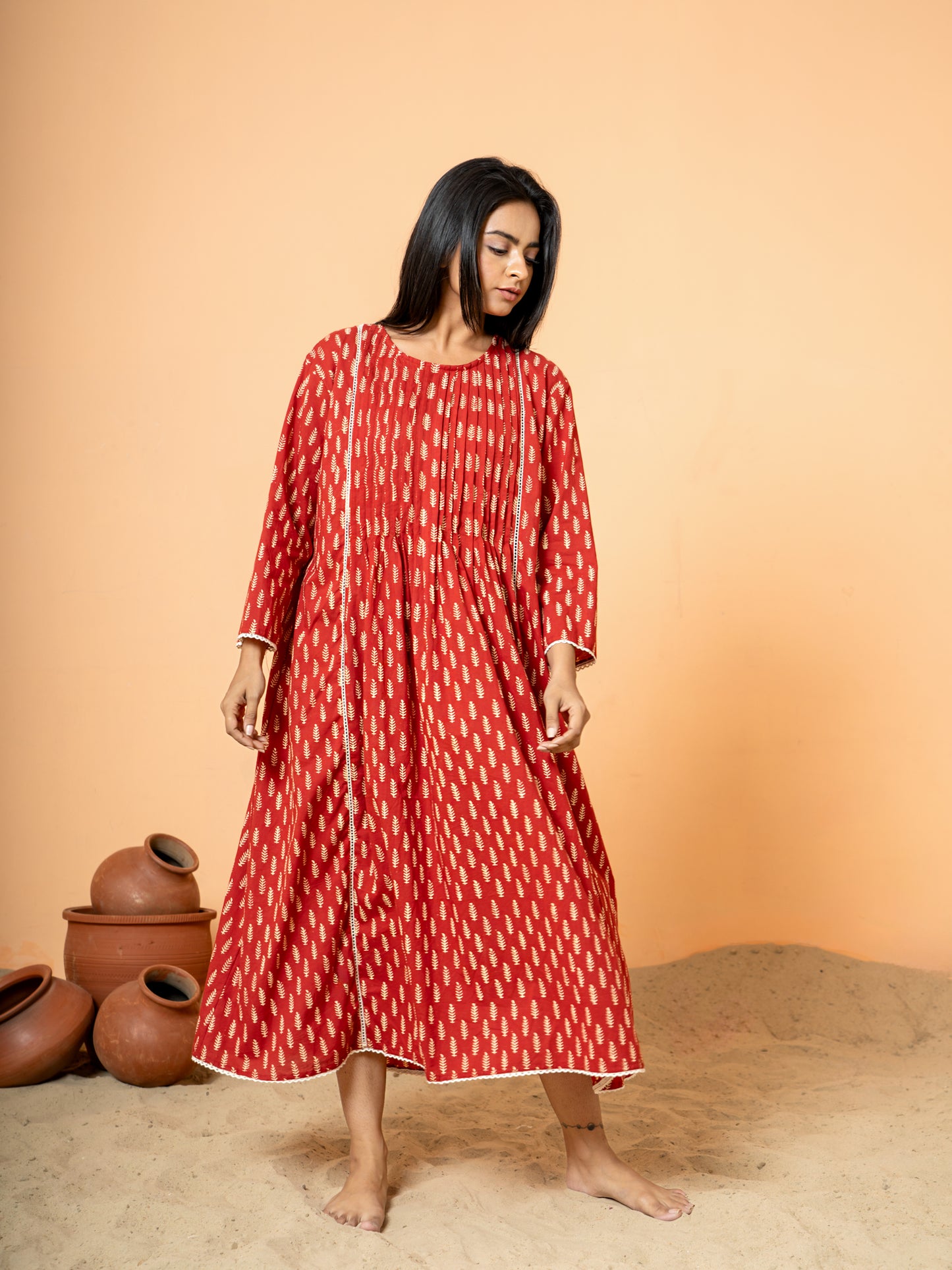 Stylish shot of the Red Palm Leaf Printed Cotton Kurta, showcasing the comfortable Regular Fit and its elegance for casual outings and everyday wear.