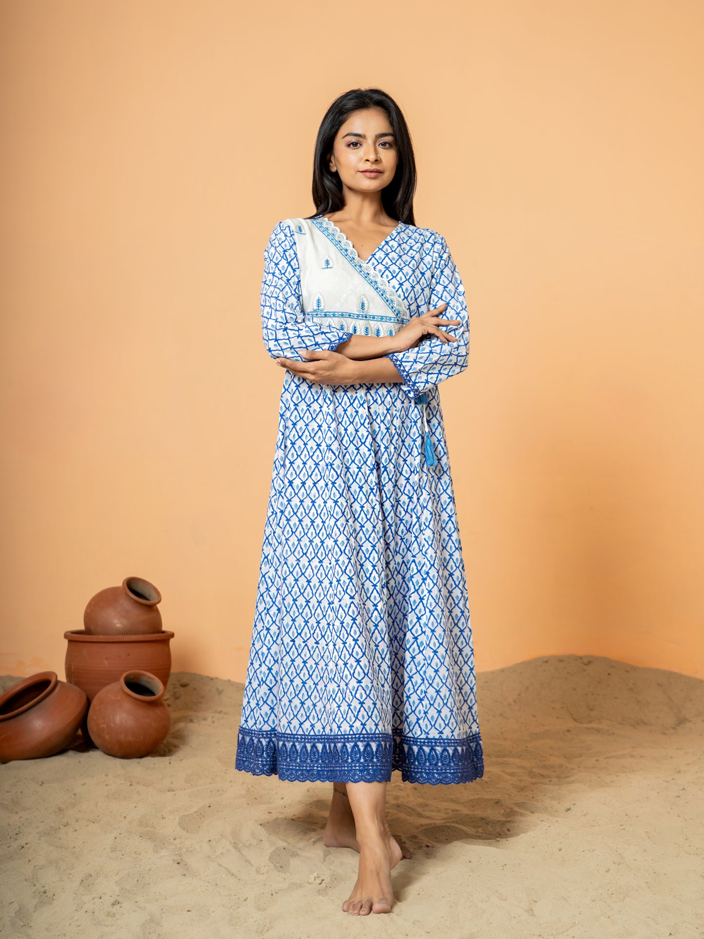 View of the hemline or sleeve cuff of the Breezy Blue Jaal Handblock Print Kurta, showcasing the finishing detail or border of the Jaal print.