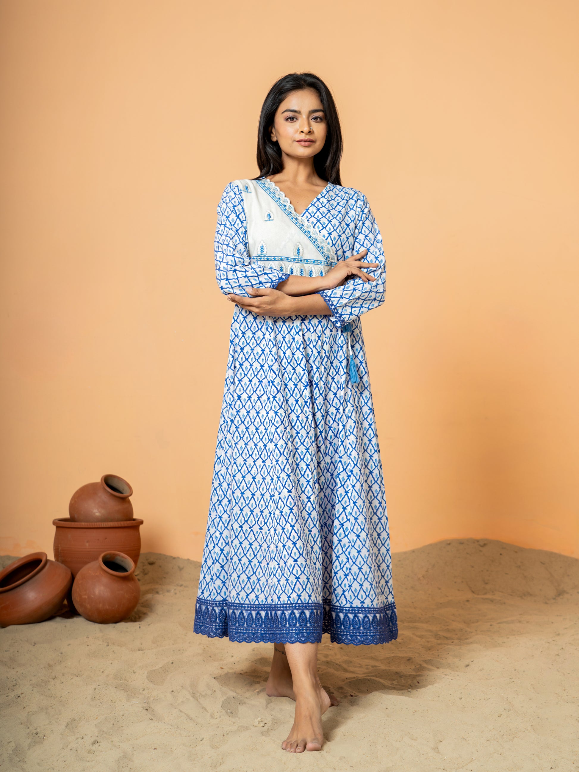View of the hemline or sleeve cuff of the Breezy Blue Jaal Handblock Print Kurta, showcasing the finishing detail or border of the Jaal print.