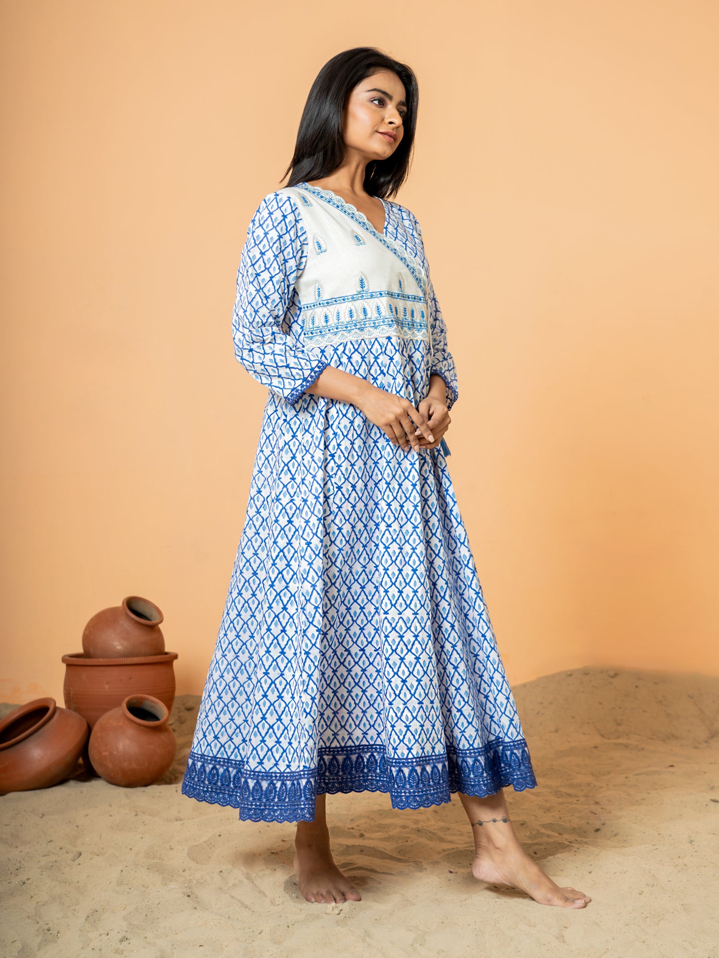 Side view of the Breezy Blue Jaal Handblock Print Kurta, demonstrating the relaxed fit and comfortable drape of the cotton material.