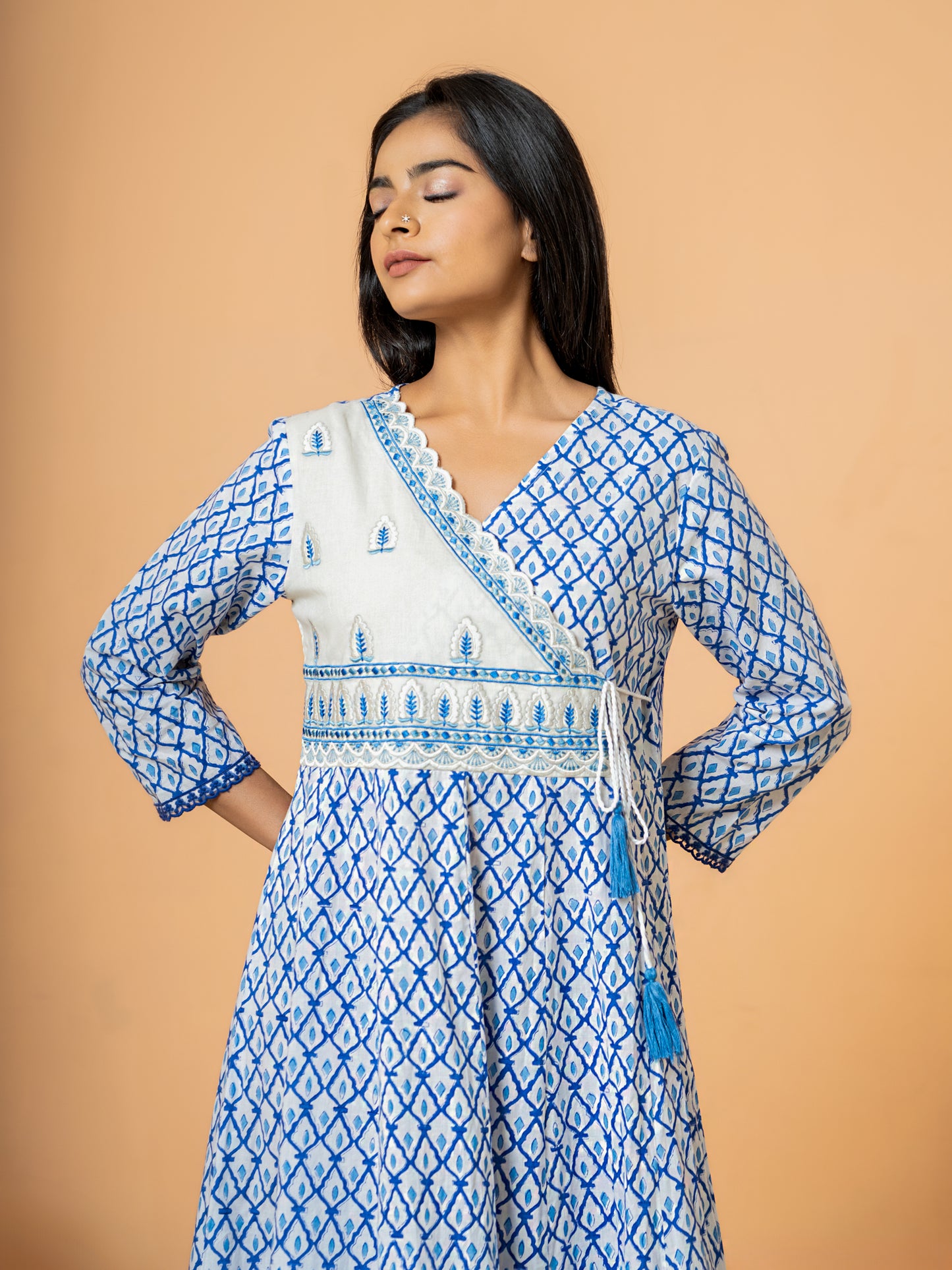 Detailed close-up of the intricate Jaal handblock print design on the breezy blue cotton fabric, showing the artisanal texture.