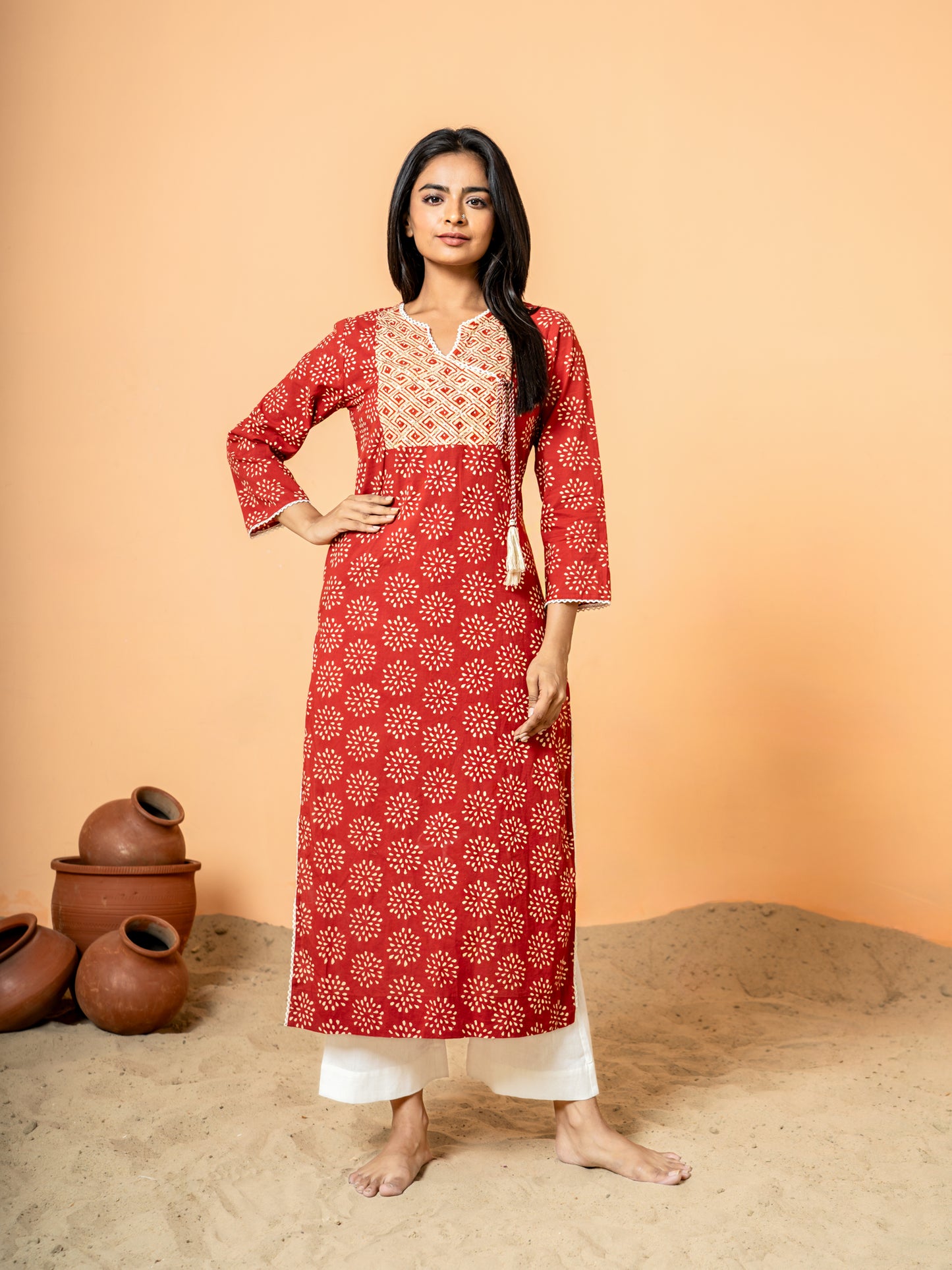 Full front view of the Red Embroidered Rangoli Print Cotton Kurta made from pure cotton with intricate embroidery.