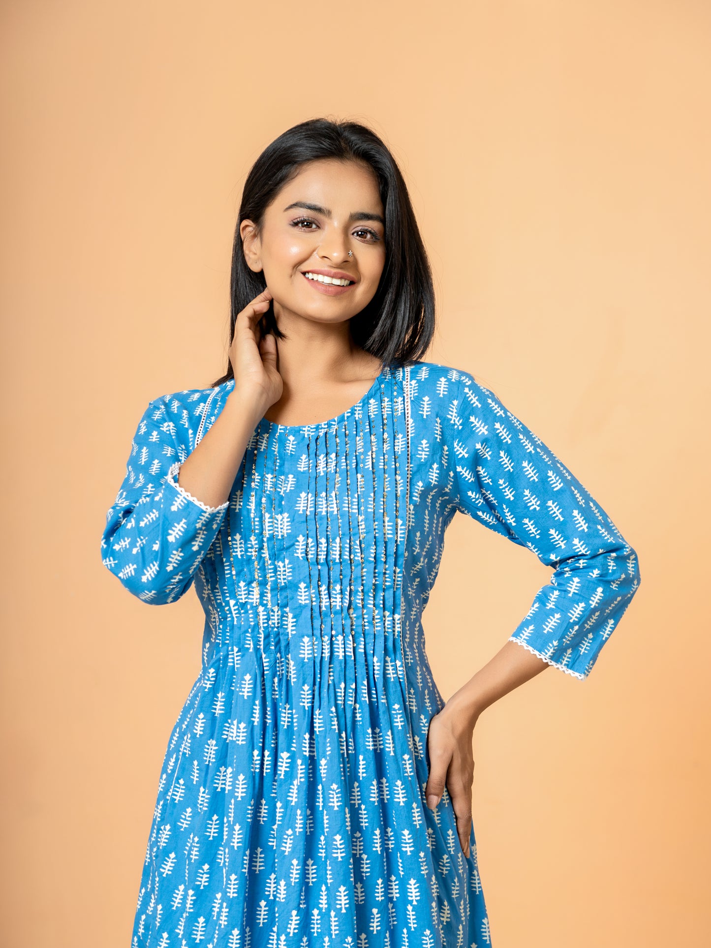 Image showing the comfortable and versatile 3/4th sleeves of the elegant Blue Palm Leaf Printed Cotton Kurta, perfect for all seasons and events.