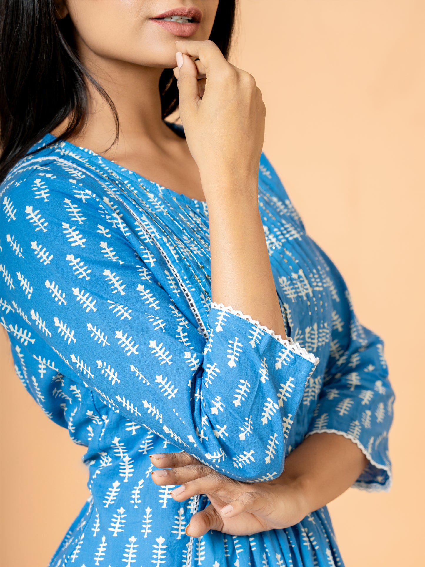 Close-up detail highlighting the intricate palm leaf prints and the texture of the soft, breathable pure cotton fabric of the Blue Printed Cotton Kurta.