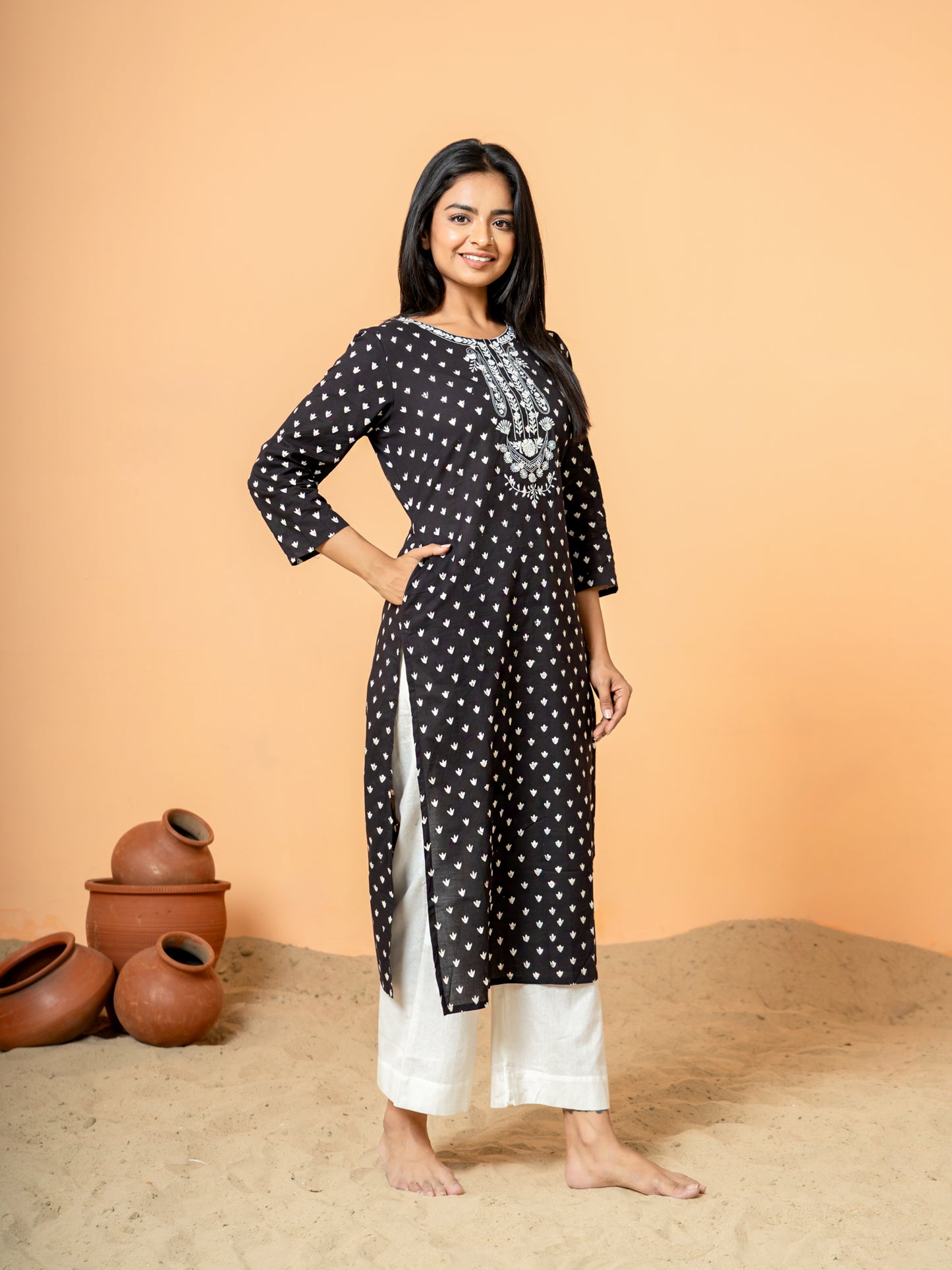 Image highlighting the convenient side pocket feature on the Elegant Black Embroidered Cotton Kurta.