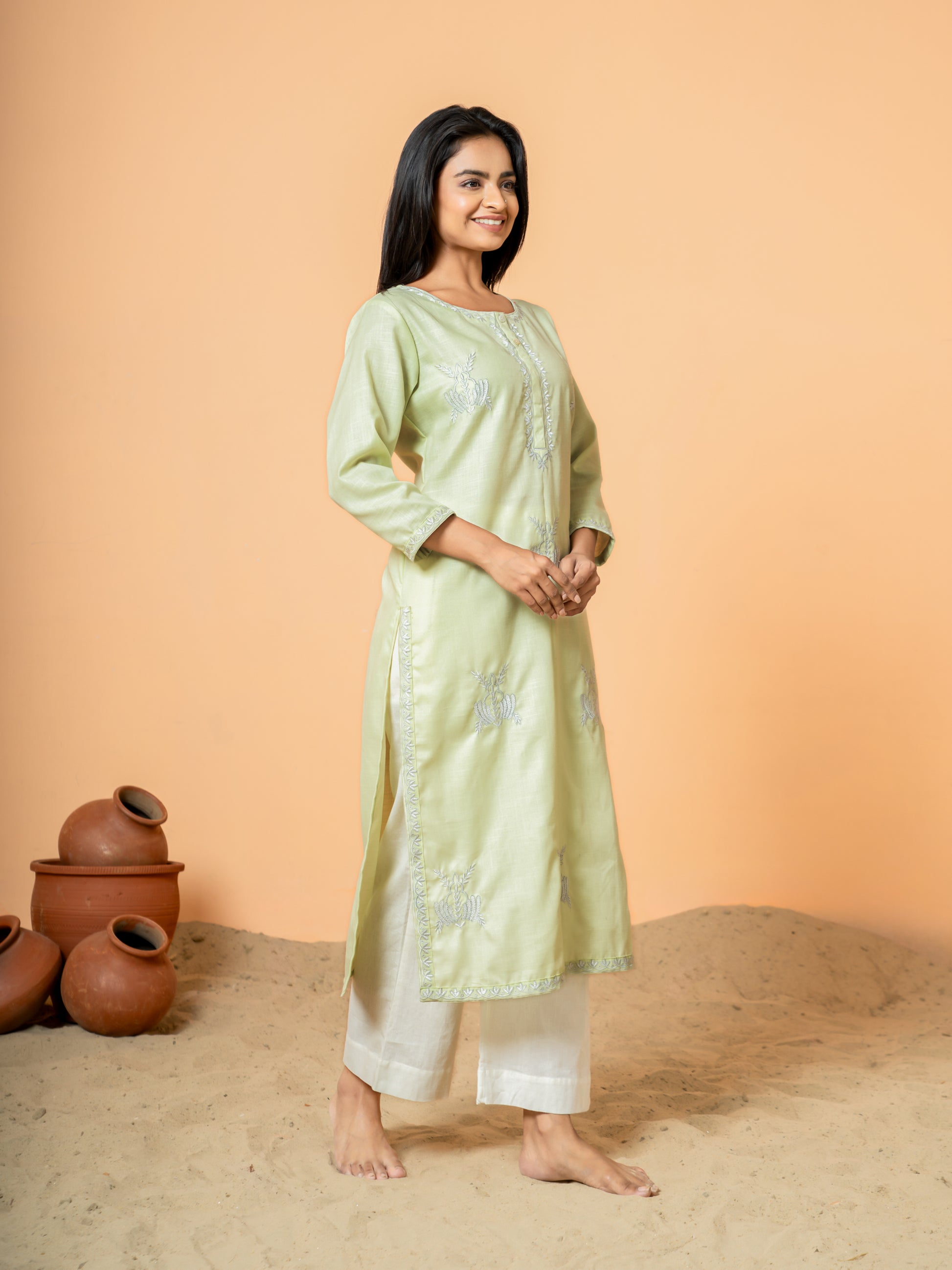 Full-length image of the Pretty Pista Embroidered Straight Cotton Kurta by Cottons Daily, perfect for casual outings, festive events, and everyday wear.