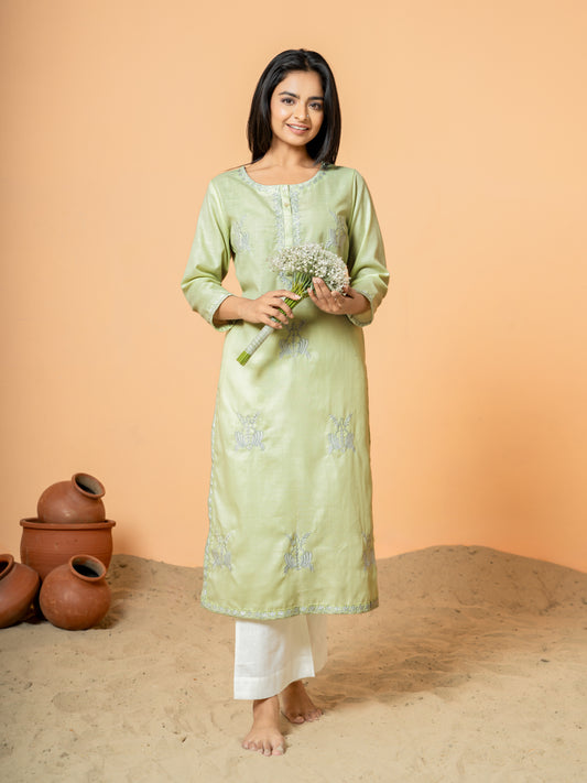 Front view of Pretty Pista Embroidered Straight Cotton Kurta by Cottons Daily, showcasing intricate embroidery on soft, breathable pure cotton fabric.