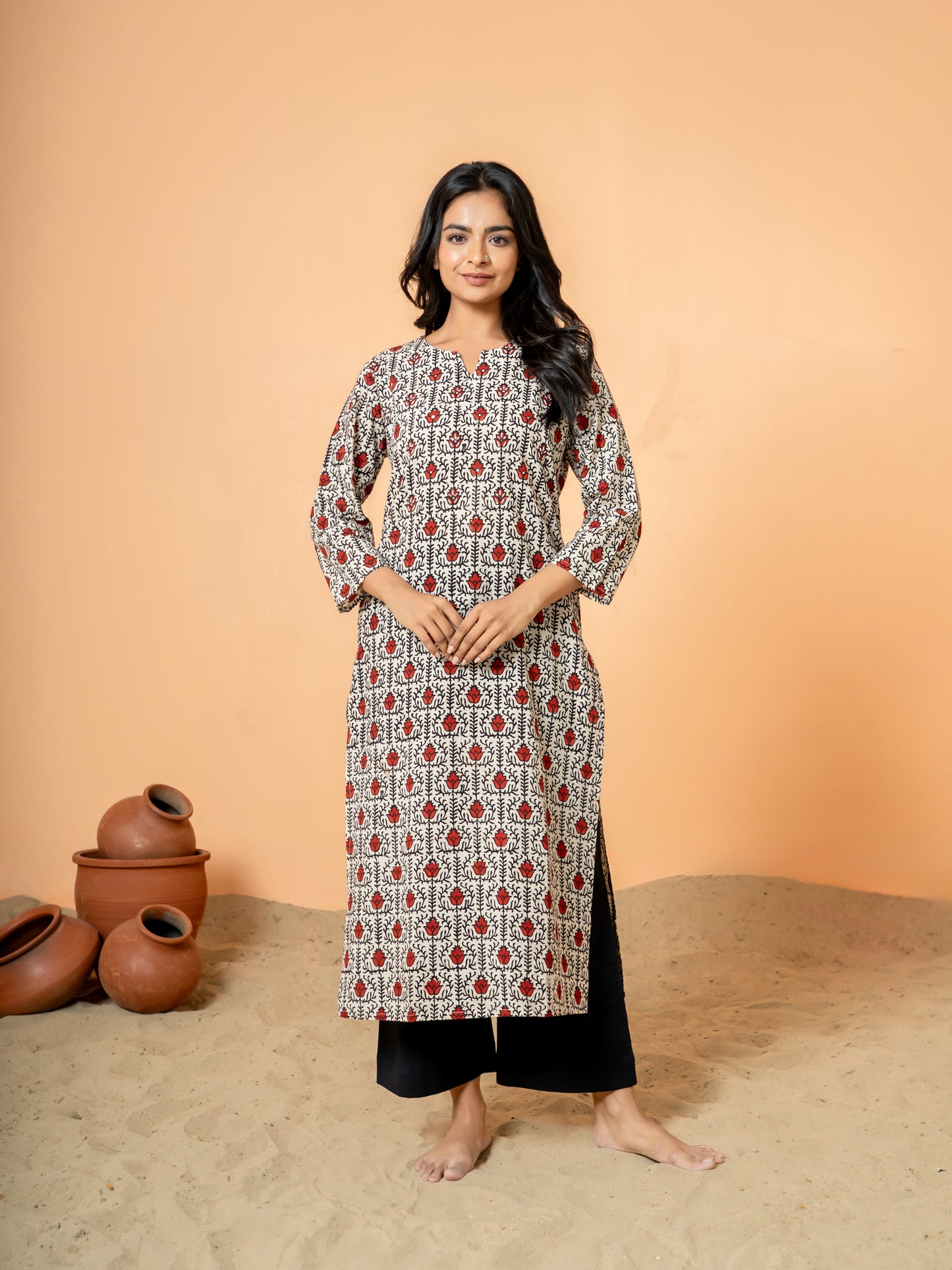 Full front view of the Cream Lotus Print Cotton Kurta for women, made from pure cotton with a beautiful handblock lotus print and round V neck.