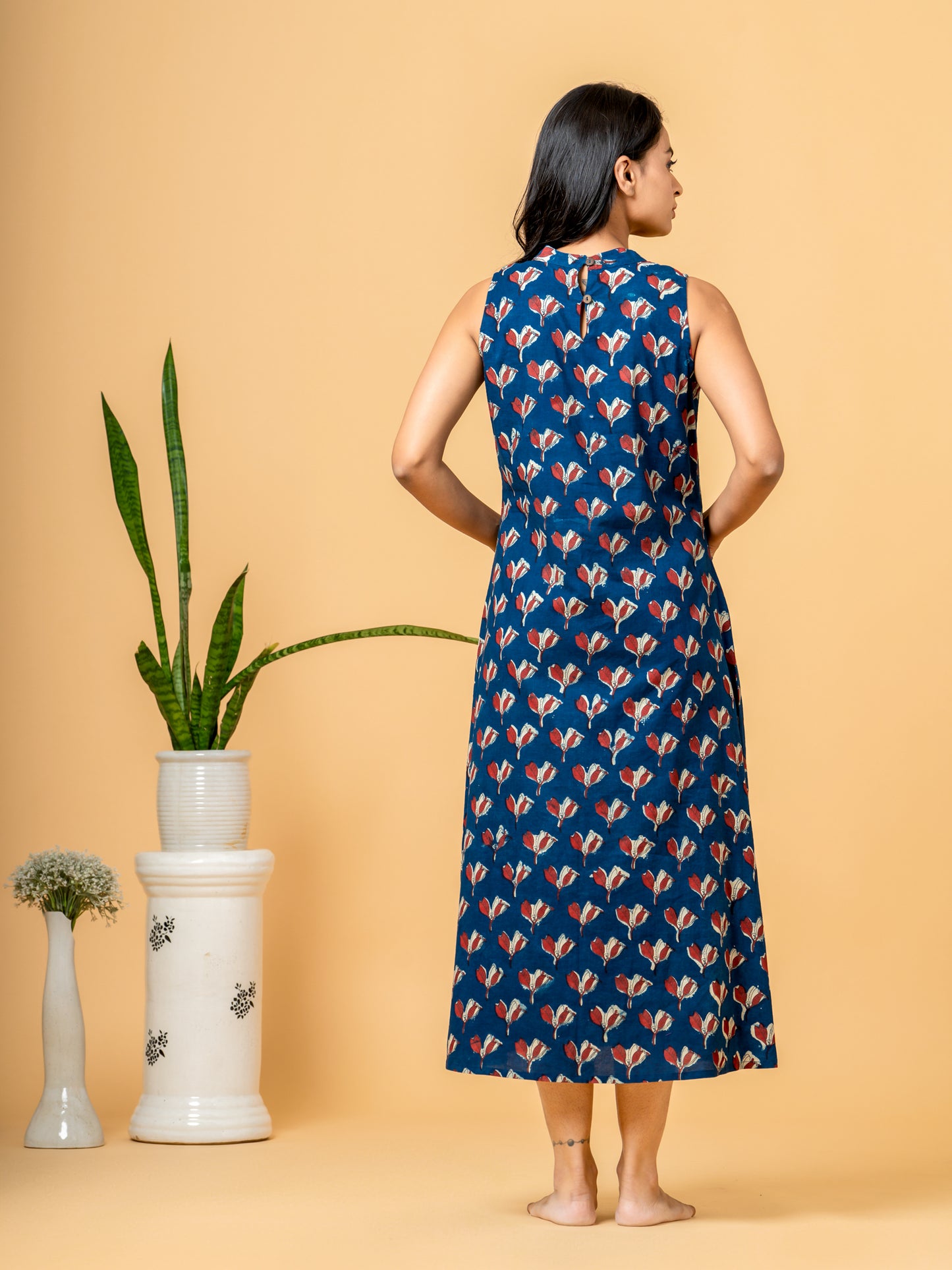 Detailed back view of the intricate indigo floral print pattern on the soft, breathable cotton fabric of the kurta.