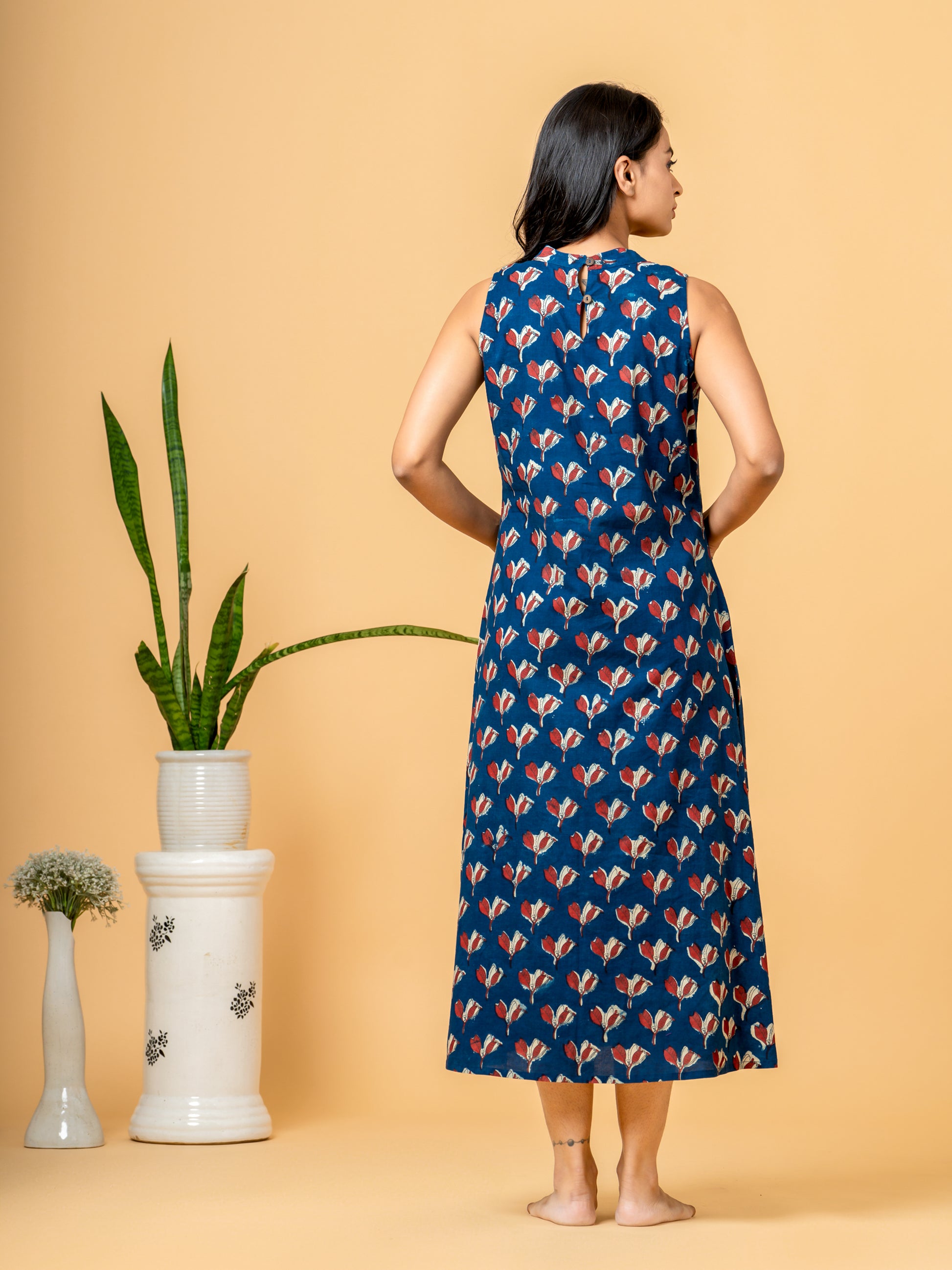 Detailed back view of the intricate indigo floral print pattern on the soft, breathable cotton fabric of the kurta.