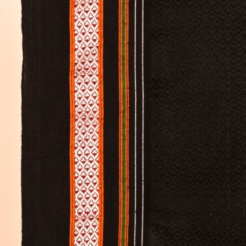 Black blouse piece with a sleek black border, perfectly complementing the Abha Rani Pink Hati Mor Cotton Khun Saree. The Mercerised Cotton Khun fabric ensures comfort and elegance, making it an ideal match for this handcrafted masterpiece from Cottons Daily.