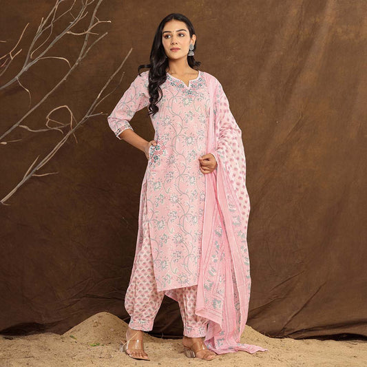 Side View: Side profile of the Baby Pink Lotus Printed Afghani Cotton Suit, highlighting the Afghani-style printed pants and the flowing printed dupatta.