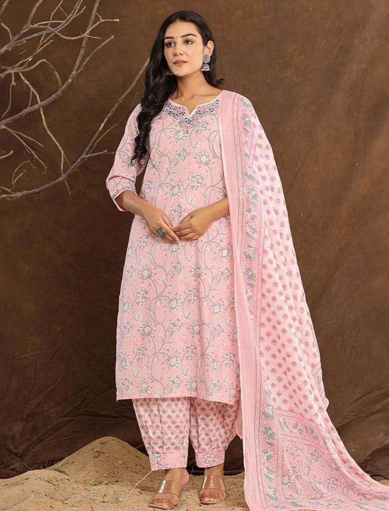 Front View: A model wearing a Baby Pink Lotus Printed Afghani Cotton Suit from Cottons Daily, featuring a round neck with a slight V cut, 3/4th sleeves, and intricate embroidery with gotta patti foil work.