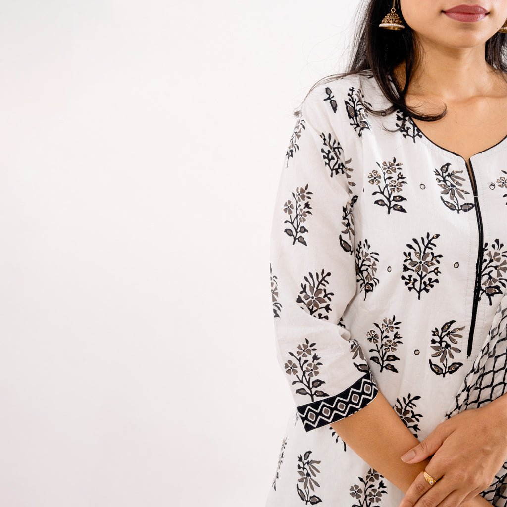 Close-up of the intricate mirror work on the Black & White Printed Cotton Suit's kurta, highlighting the craftsmanship of Cottons Daily.