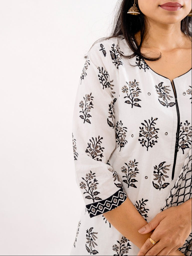 Close-up of the intricate mirror work on the Black & White Printed Cotton Suit's kurta, highlighting the craftsmanship of Cottons Daily.