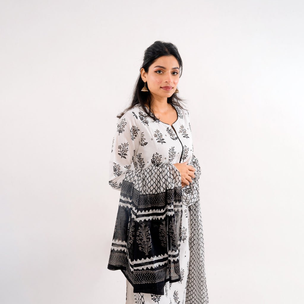 Full ensemble of the Black & White Printed Cotton Suit by Cottons Daily, showcasing the printed straight-fit pants and matching dupatta.