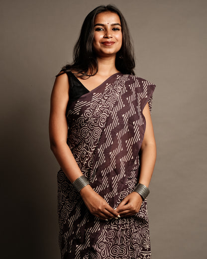 Front view of Wine Aesthetic Handblock Print Mul Cotton Saree by Cottons Daily, showcasing geometric handblock patterns on soft malmal fabric.
